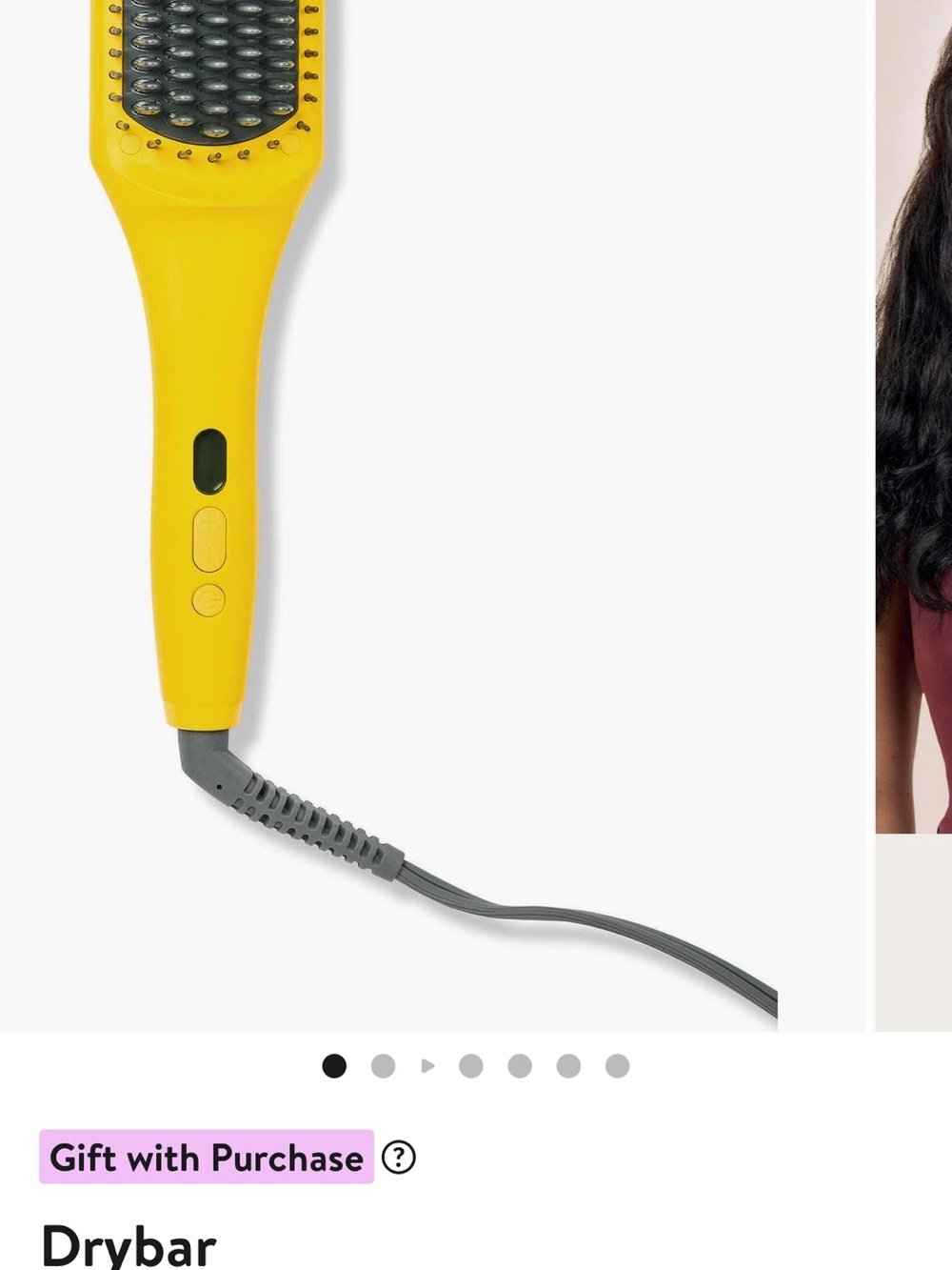 Mini heated straightening brush.